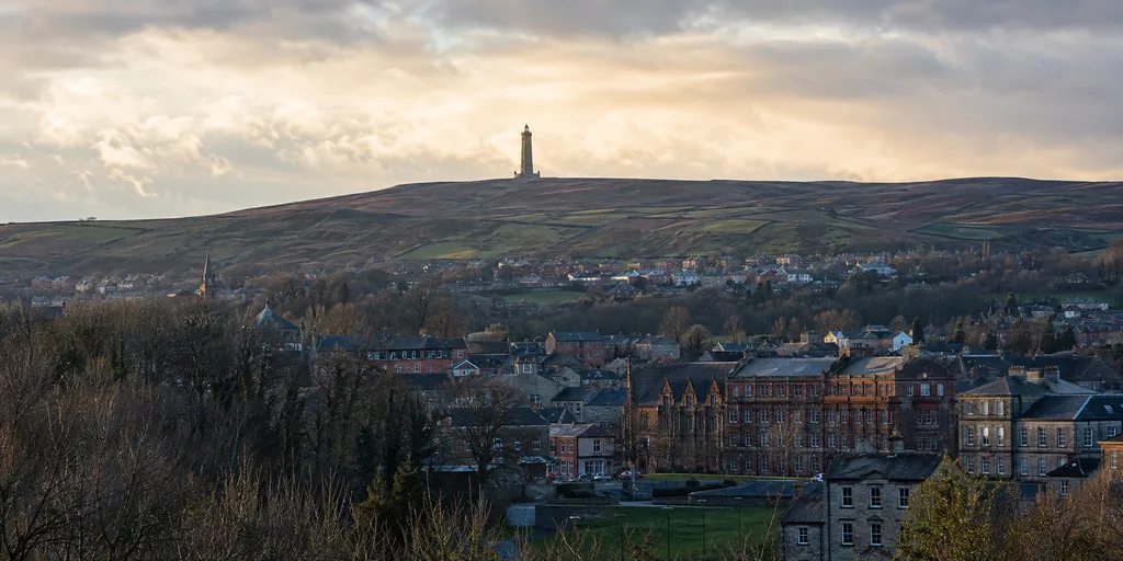 Darwen town and moorland landscape with Darwen Tower on the skyline.